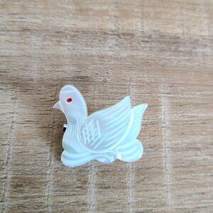 Vintage mother of pearl duck brooch.